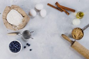 Baking ingredients on a white counter top.