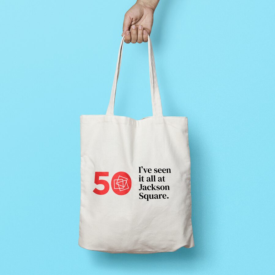 image of the a tote bag with the Jackson Square 50th logo and the tagline 