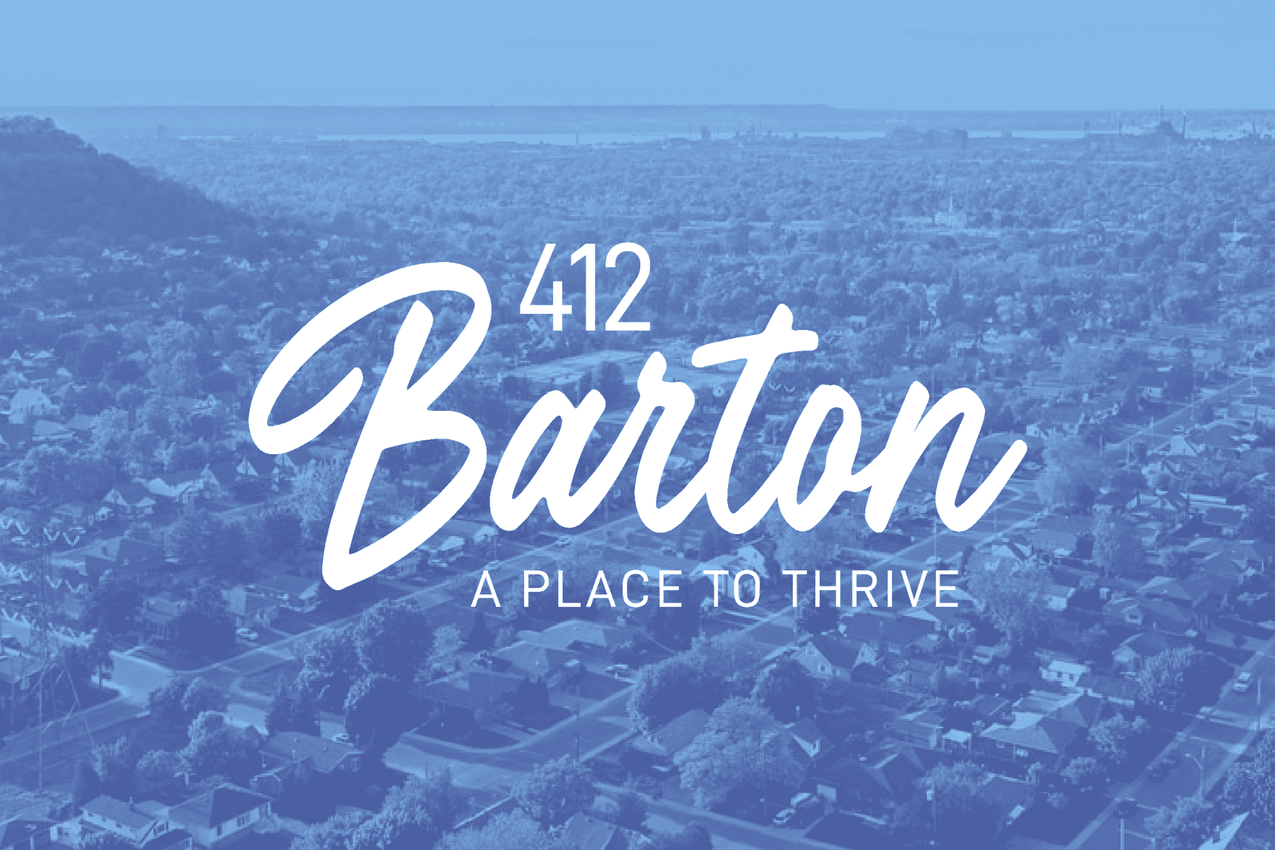 Blue duotone image of Hamilton with a white 412 Barton text-based logo on top