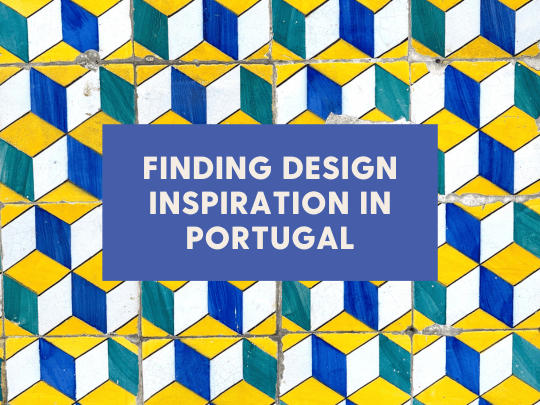 Centred text reading "Finding Design Inspiration in Portugal" on a blue and yellow bold, geometric tile wall